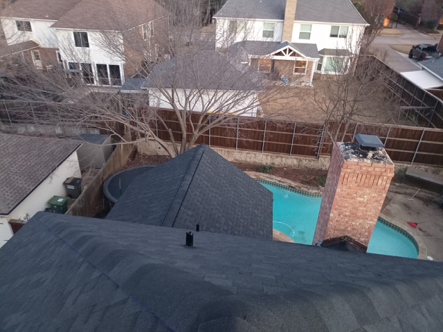 Completed dark shingle roof Fort Worth